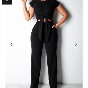 Two piece black pant set. No tags never worn.